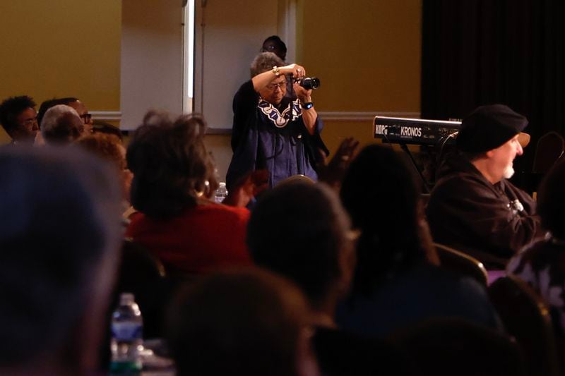 Photographer Susan “Sue” Ross takes photos during First Friday’s Jazz concert at First Congressional Church, UCC in Atlanta on Friday, Feb. 2, 2024. (Natrice Miller/ Natrice.miller@ajc.com)