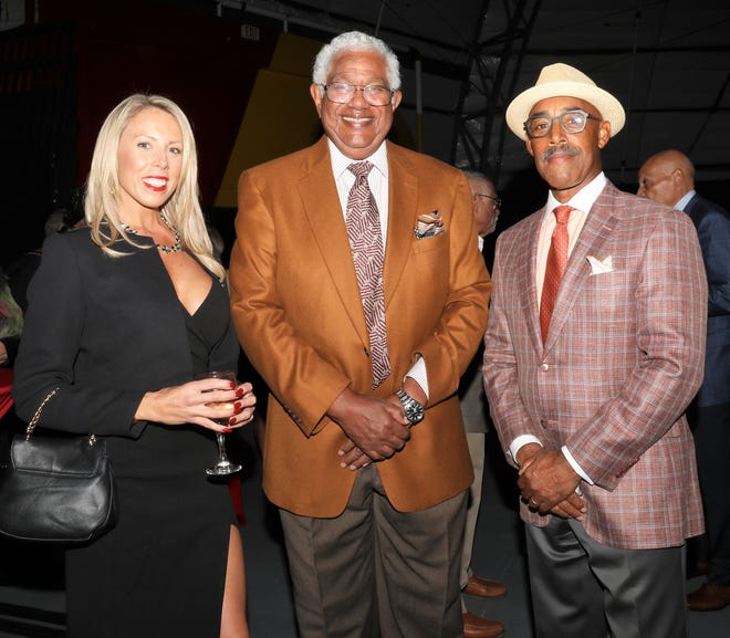 Victoria Chartrand (L) Tom Cunningham and Doug Anderson (R) in conversation during the cocktail hour. The Westcoast Black Theatre Troupe’s 22nd Anniversary Gala was held on Saturday, December 4, 2021 at the Circus Arts Conservatory’s Sailor Circus Arena in Sarasota, Florida. The event titled “A Night at the Savoy” turned the arena into a replication of New York City’s famous Harlem public, no-discrimination ballroom, The Savoy, which was in operation from 1926 – 1958.WBTT uses funds for education, artist development and a mentoring program geared toward underserved young people.