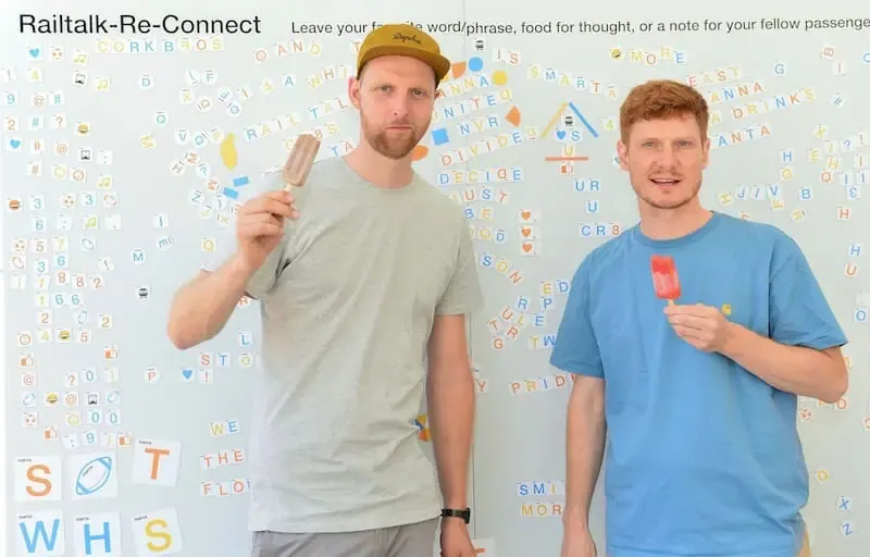Designers Wouter Corvers (left) and Bouke Bruins enjoy a King of Pops moment as they celebrate their creative Railtalk design for Atlanta's MARTA stations. / Photos by Kimberly Evans