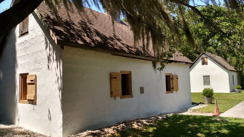 St. Simons Island tabby cabins: This "after" photo shows the exterior of the buildings after the walls had been repaired. According the the Cassina Garden Club, the walls' restoration revealed the original window openings and some of the paint the slaves used on the interior walls.(Courtesy of the Cassina Garden Club)