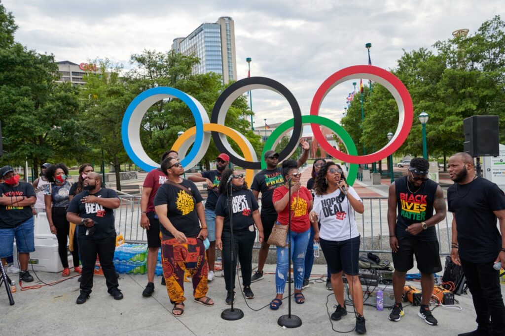Juneteenth speech in front of the Olympic Rings statue in Atlanta