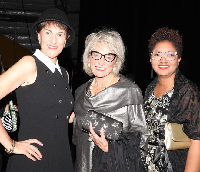 Media Relations Director Sharon Kunkel, Past President and CEO of Planned Parenthood of Southwest and Central Florida and current Grandma to seven-month old Charlotte, Barbara Zdravecky (C) and supporter Dawnelle Singleton are catching up with each other during the cocktail hour.  The Westcoast Black Theatre Troupe’s 22nd Anniversary Gala was held on Saturday, December 4, 2021 at the Circus Arts Conservatory’s Sailor Circus Arena in Sarasota, Florida. The event titled “A Night at the Savoy” turned the arena into a replication of New York City’s famous Harlem public, no-discrimination ballroom, The Savoy, which was in operation from 1926 – 1958. WBTT uses funds for education, artist development and a mentoring program geared toward underserved young people.