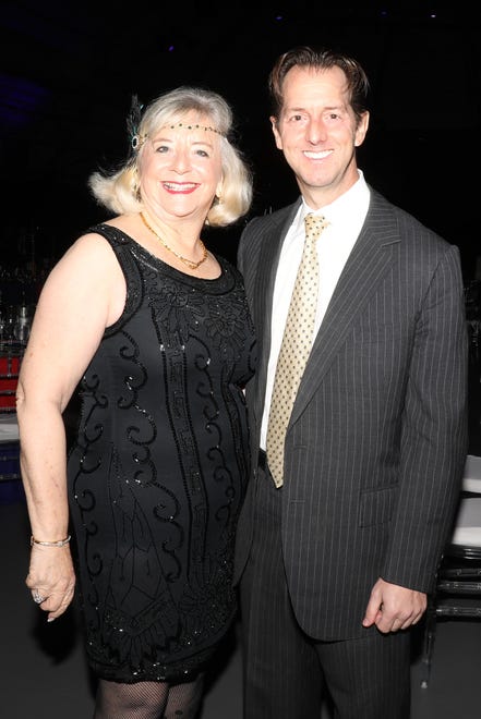 Sarasota High School Alum and tonight's Honoree is Marian Moss who was Chair of the Board of Trustees from 2015-2020. She is photographed with her son, Jeff, Riverview HS ' 91. Jeff flew in from Seattle to be by his mother's side for tonight's gala. The Westcoast Black Theatre Troupe’s 22nd Anniversary Gala was held on Saturday, December 4, 2021 at the Circus Arts Conservatory’s Sailor Circus Arena in Sarasota, Florida. The event titled “A Night at the Savoy” turned the arena into a replication of New York City’s famous Harlem public, no-discrimination ballroom, The Savoy, which was in operation from 1926 – 1958.  WBTT uses funds for education, artist development and a mentoring program geared toward underserved young people.