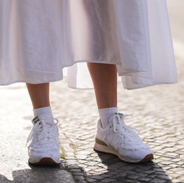 berlin, germany may 31 lena naumann wearing new balance x miu miu white sneaker, cecilie bahnsen white maxi dress on may 31, 2022 in berlin, germany photo by jeremy moellergetty images