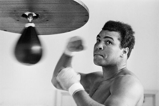 Muhammad Ali punches bag here March 31 (Tokyo Time) for his April 1 bout with heavyweight Mac Foster