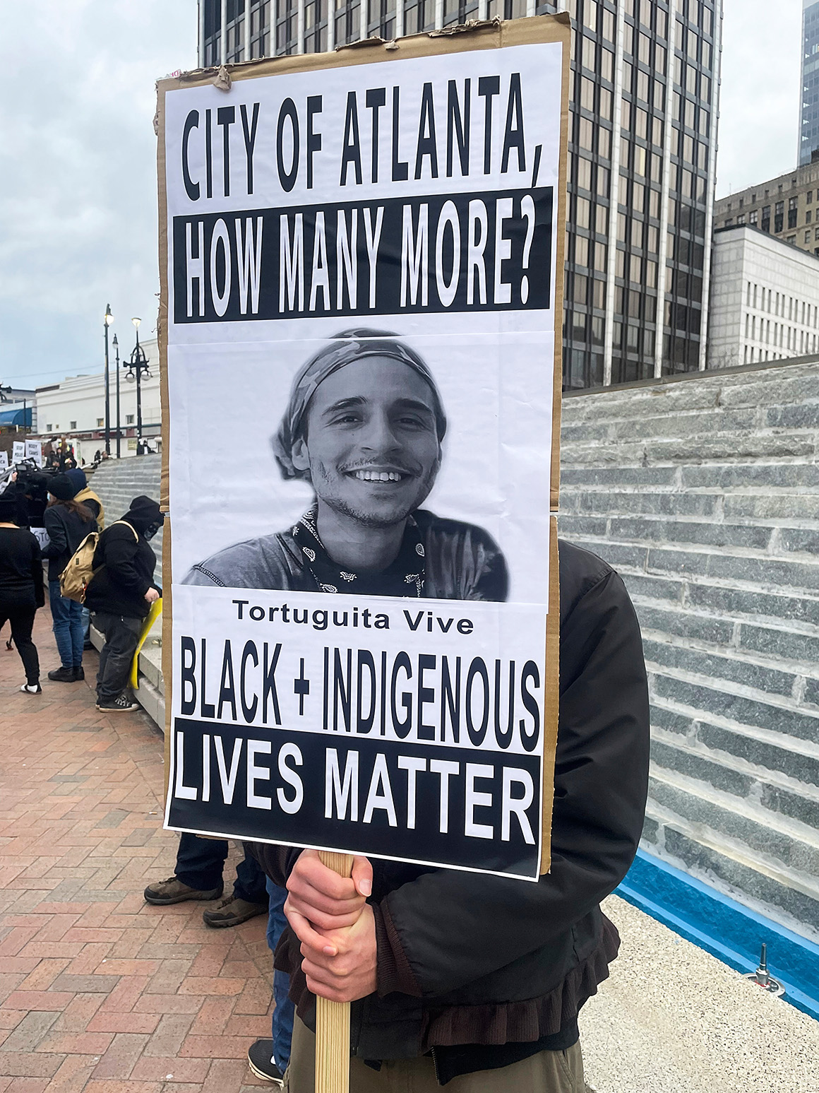 A demonstrator holds a sign protesting the death of an environmental activist, who went by Tortuguita, in Atlanta on Saturday. A demonstrator holds a sign protesting the death of an environmental activist, who went by Tortuguita, in Atlanta on Saturday.