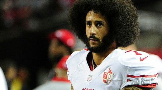 Colin Kaepernick #7 of the San Francisco 49ers looks on from the sidelines during the second half against the Atlanta Falcons at the Georgia Dome on December 18, 2016 in Atlanta, Georgia