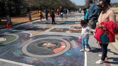 Drew Charter School unveils Black Lives Matter mural inspired by Emory exhibit