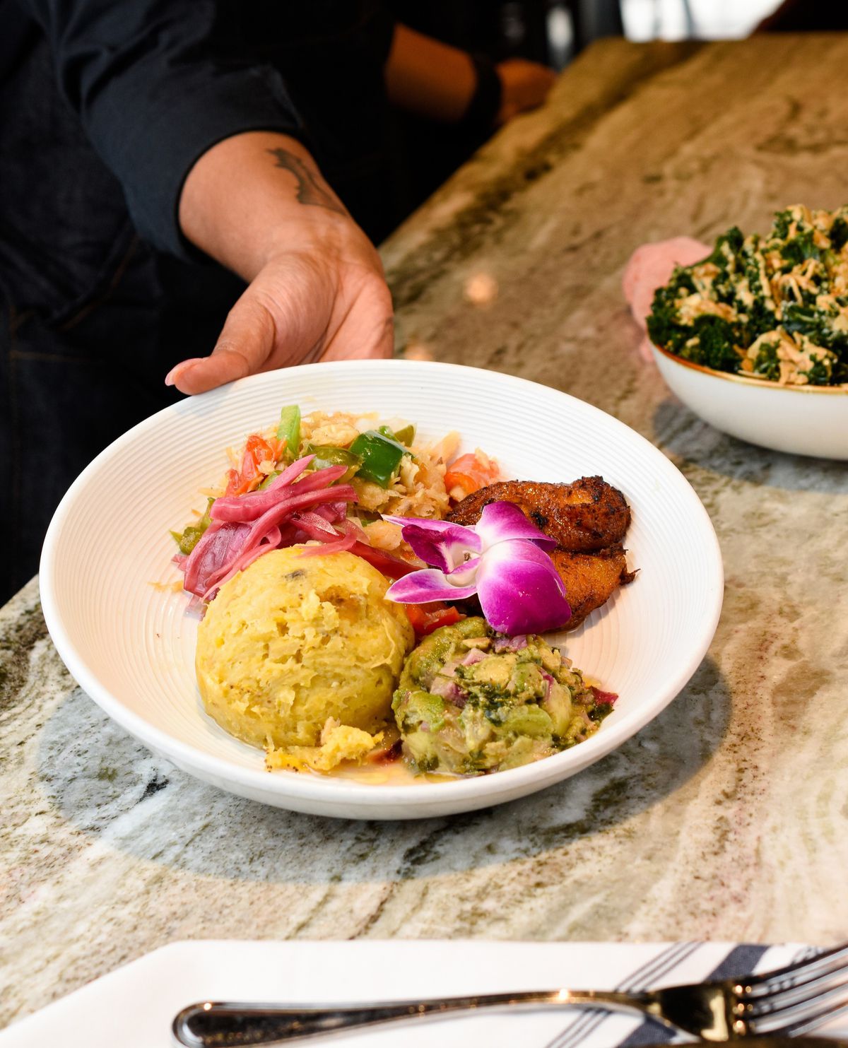 Saltfish mangu with fried plantains and avocado mash from Ms. Icey’s Kitchen and Bar in Atlanta. 