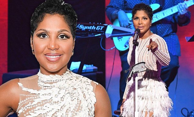Toni Braxton wows in sheer white gown as she’s honored at BMI R&B/Hip-Hop Awards