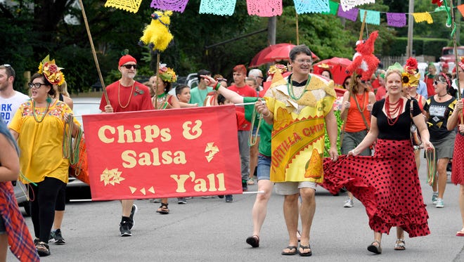 A parade kicks off the 14th annual Tomato Art Fest in East Nashville on Saturday, August 12, 2017.