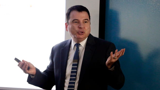 Timothy Renick, a Georgia State Vice President, conducts a workshop for high school guidance counselors on the programs they have instituted to guarantee academic success and promise students a degree in four years. Leaders at the school- located a few blocks from Martin Luther King Jr.'s birthplace - wanted to nurture students who didn't excel in high school, who didn't know anything about navigating college, and who didn't have anyone to guide them.