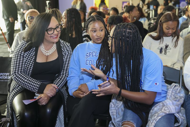 U.S. Rep. Nikema Wiliams, left, talks with Spelman students Kaitlyn Bowman, center, and Tamara Morgan before the Spelman Creator Day at the Wellness Center Gymnasium at Spelman College, Monday, March 20, 2023, in Atlanta. Jason Getz / Jason.Getz@ajc.com)
