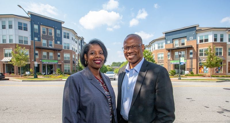 The Integral Group, including President of Real Estate Vicki Lundy Wilbon, left, and Chairman Egbert Perry, right, is developing Scholars Landing along Atlanta Student Movement Boulevard near Clark Atlanta University on Monday, June 5, 2023. The development has multi-family housing, independent senior living units and more lots ready for development soon. Both leaders are involved in the Integral Collaborative. (Jenni Girtman for The Atlanta Journal-Constitution)