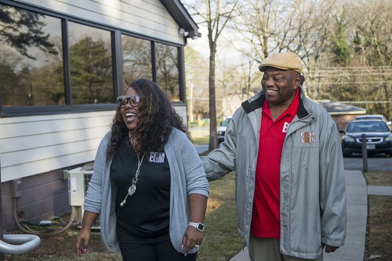 EGM Services Inc. CEO Kelsi Queen-Robinson (left) and her father, Arthur Queen, chairman of the board of EGM Services Inc., share a laugh at their office in Decatur Jan. 24, 2020. Queen-Robinson left her job as an educator and got an MBA to help run her father’s business. ALYSSA POINTER/ALYSSA.POINTER@AJC.COM