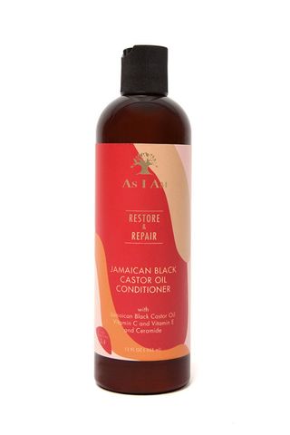 bottle of conditioner with red and orange label