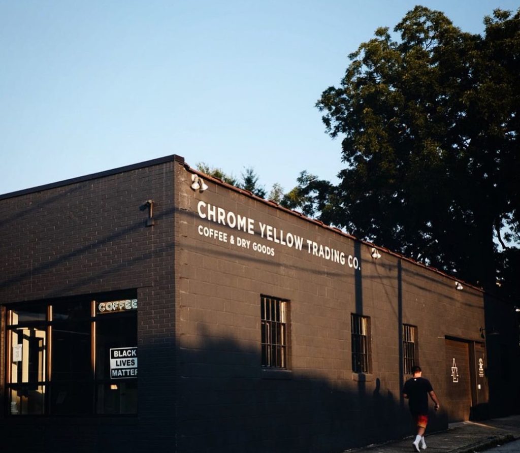 The exterior of Chrome Yellow Trading Co. on a clear day.
