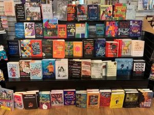 huge display of colorful books at a bookstore