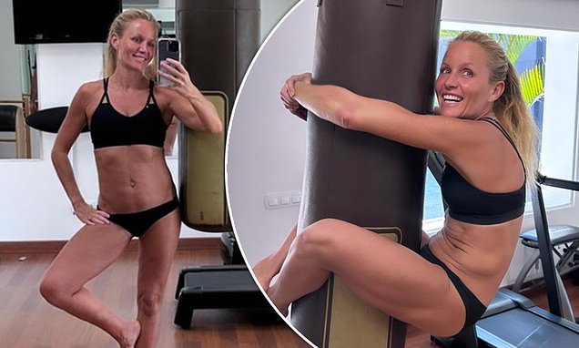 Davinia Taylor shows off her three stone weight loss in a black bikini as she works out in the gym