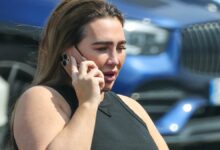Lauren Goodger rocks skintight black sportswear as she hits the gym for a gruelling workout after revealing she regrets ever having cosmetic surgery
