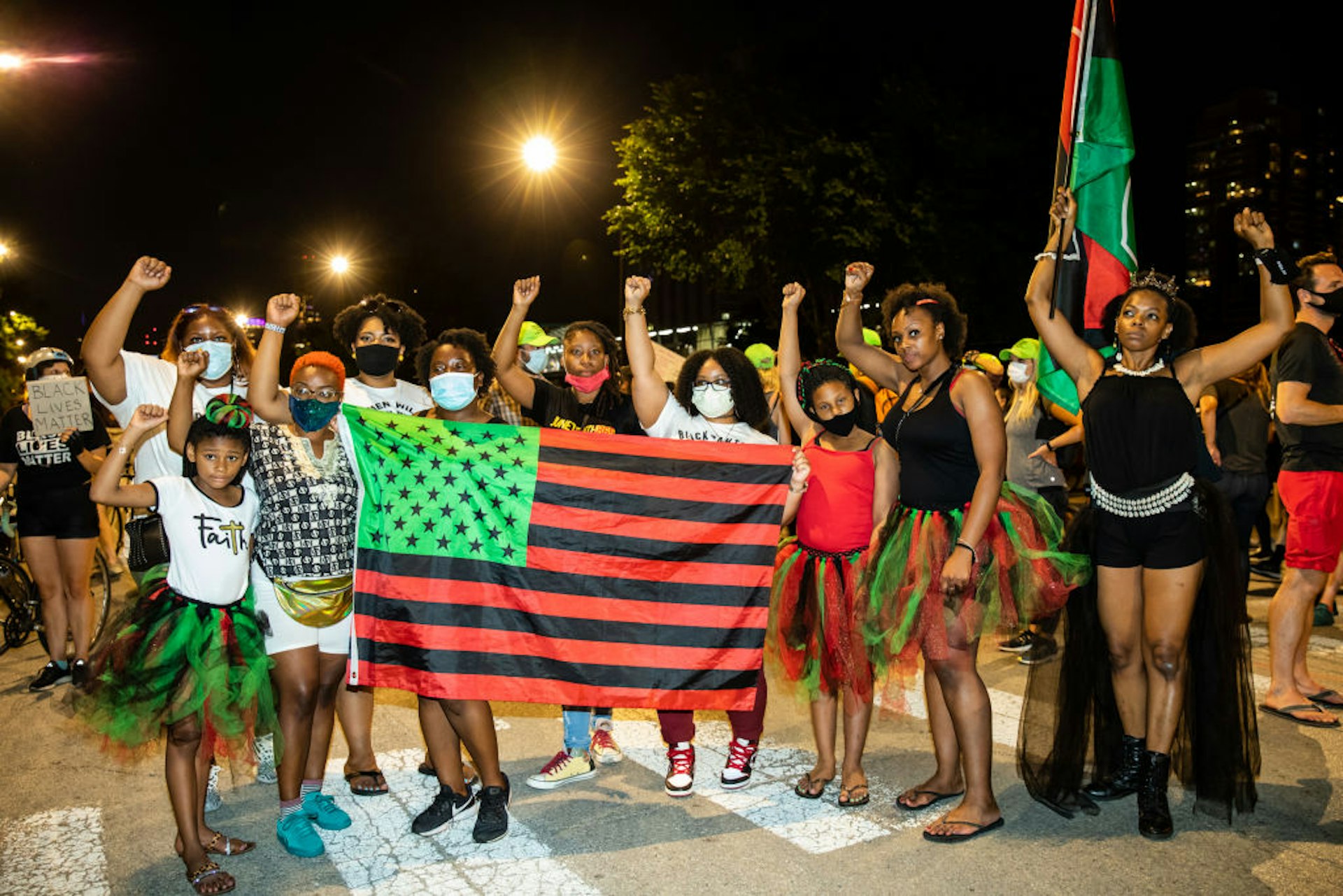 A family poses together during the Chicago Peace March on June 19, 2020 in Chicago, Illinois