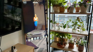 Mirror screen showing a trainer leading a workout