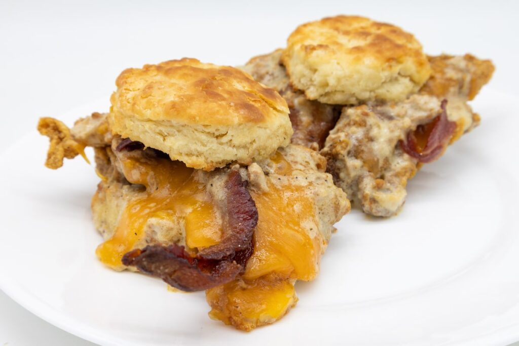 Southern Style Fried Chicken Biscuit and Gravy Slider Sandwiches with Cheese and Bacon